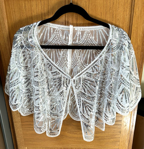 Fancy white sheer - with, silver